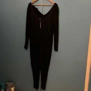 Black long sleeve romper with fringe back